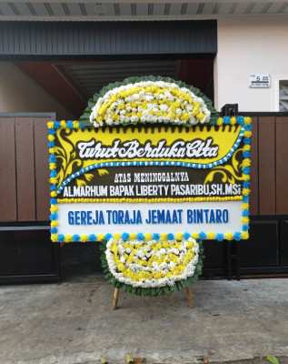 Papan Bunga Duka di Baron